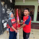 Satu Bendera, Sejuta Semangat: Murid SMP Negeri 1 Cariu Sambut HUT RI Bersama Warga